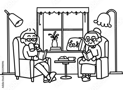 Elderly reading book at Livingroom