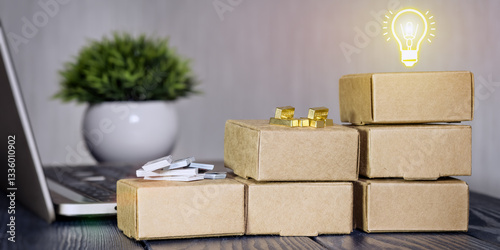 Obraz na płótnie Stacked cardboard boxes containing gold bars, a wad of dollars and a laptop symbolize e-commerce, business ideas and online investment opportunities. w salonie