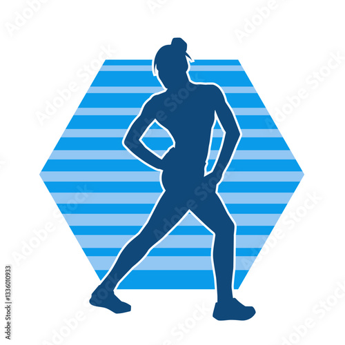 Silhouette of slim female doing exercise. Silhouette of a sporty woman doing gym workout pose. 