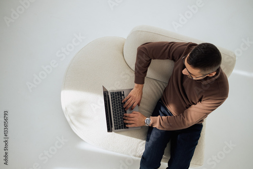 young man using laptop