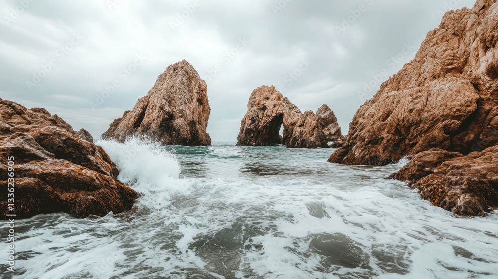 A rugged rock arch standing tall over a wild ocean coastline, an epic spot for adventure photography. A rugged rock arch standing tall over a wild ocean coastline, an epic spot for adventure photography.