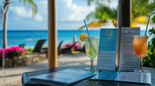 Luxury resort tour package display with tropical drinks, elegant brochures, and a vacation itinerary.