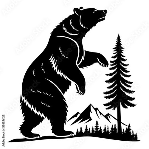 Standing bear in forest with mountain background
