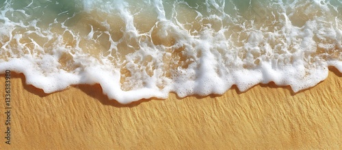 Ocean wave on sandy beach