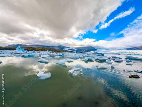 Icebergs from the Fjallsjökull glacier in the lagoon of Fjallsárlón, Iceland photo