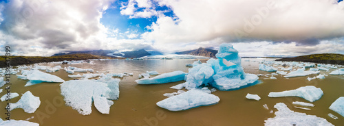 Icebergs from the Fjallsjökull glacier in the lagoon of Fjallsárlón, Iceland photo