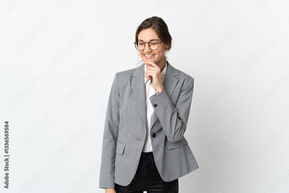 Business Ireland woman isolated on white background looking to the side and smiling Business Ireland woman isolated on white background looking to the side and smiling
