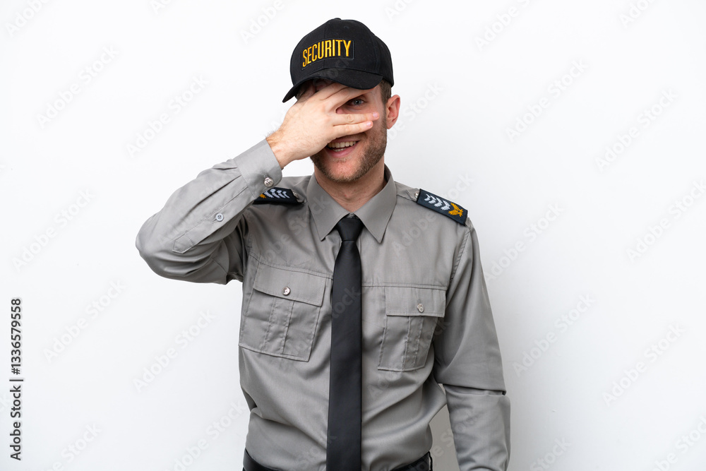 Young safeguard caucasian man isolated on white background covering eyes by hands and smiling Young safeguard caucasian man isolated on white background covering eyes by hands and smiling