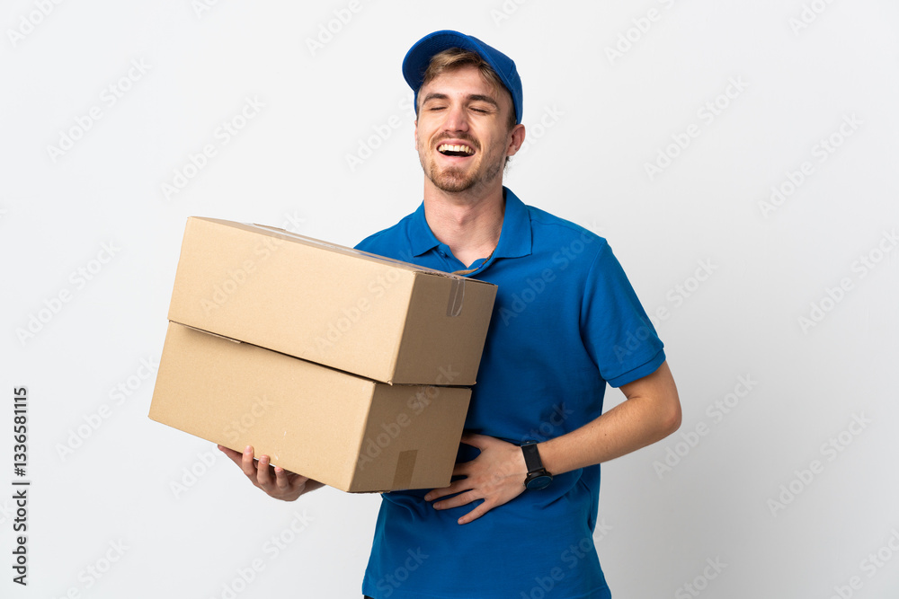 Young delivery blonde man isolated on white background smiling a lot Young delivery blonde man isolated on white background smiling a lot
