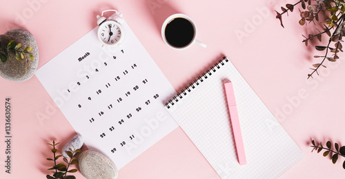 Obraz na płótnie Monthly calendar and blank planning notebook on the desktop top view web banner w salonie
