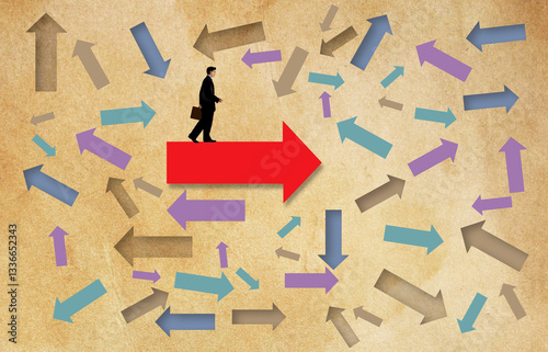 Photography A businessman moves forward on his chosen path, undeterred by attempts to direct him off course with arrows pointing in all direction