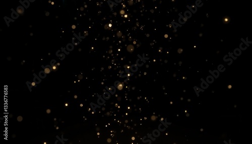 Shimmering gold confetti gently cascades down against a stark black background