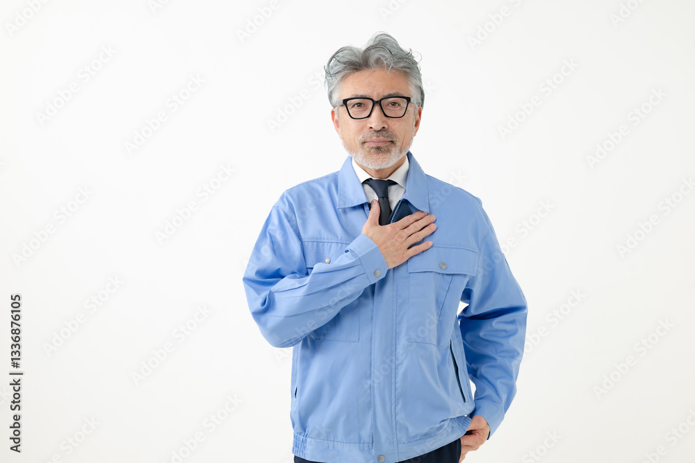 作業着姿の中高年男性