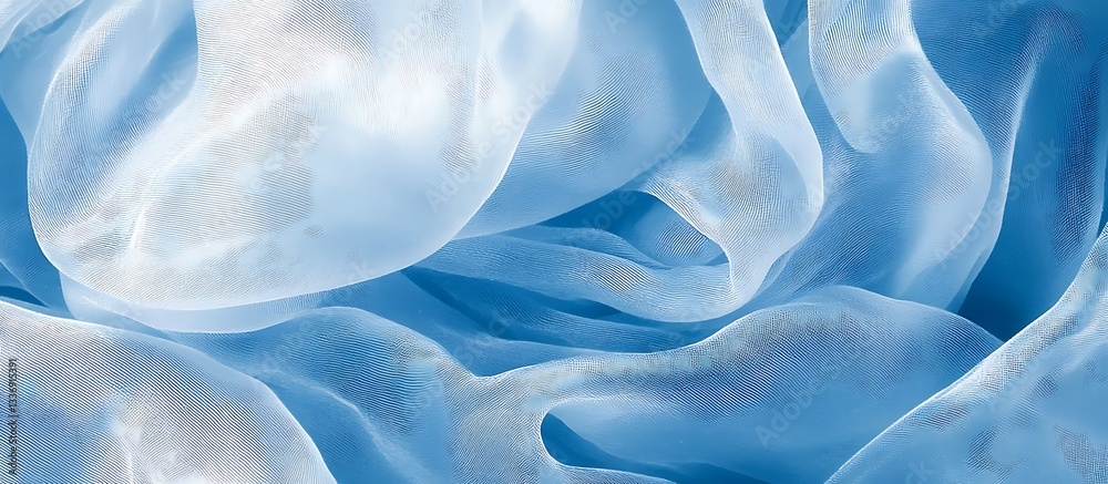 Blue silk fabric folds, closeup texture
