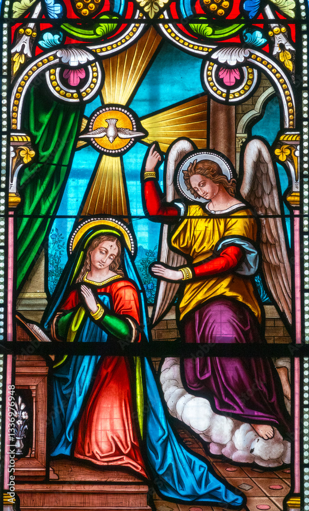 Stained glass (19th century) of Annunciation to the Blessed Virgin Mary by the Archangel Gabriel. Stained glass (19th century) of Annunciation to the Blessed Virgin Mary by the Archangel Gabriel.