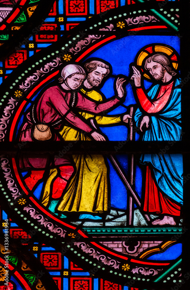 Fototapeta premium Stained glass (19th century) of Jesus-Christ heals a blind man.