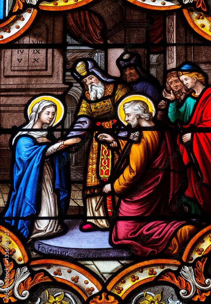 Fototapeta premium Stained glass (19th century) of Holy family: The wedding of Mary and Joseph.