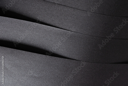 Elegant black paper texture with a shimmering, glittering finish and subtle glistening lines. Rich and premium monochrome material, perfect for luxury stationery, artistic backdrops, and decorative.
