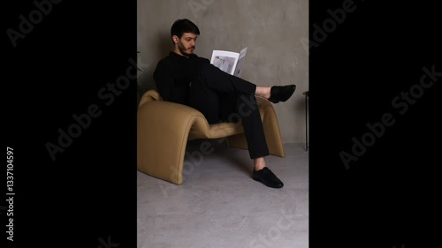 young businessman sitting on a chair