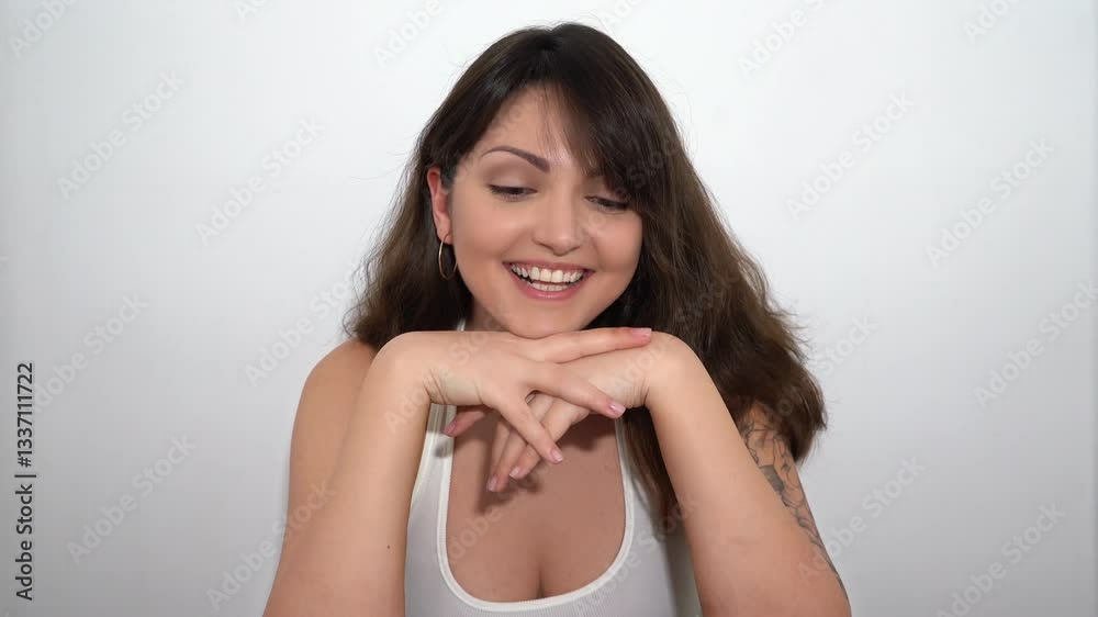 Happy Young Brunette Woman With Tattoo Posing On The White Background In The Studio Happy Young Brunette Woman With Tattoo Posing On The White Background In The Studio