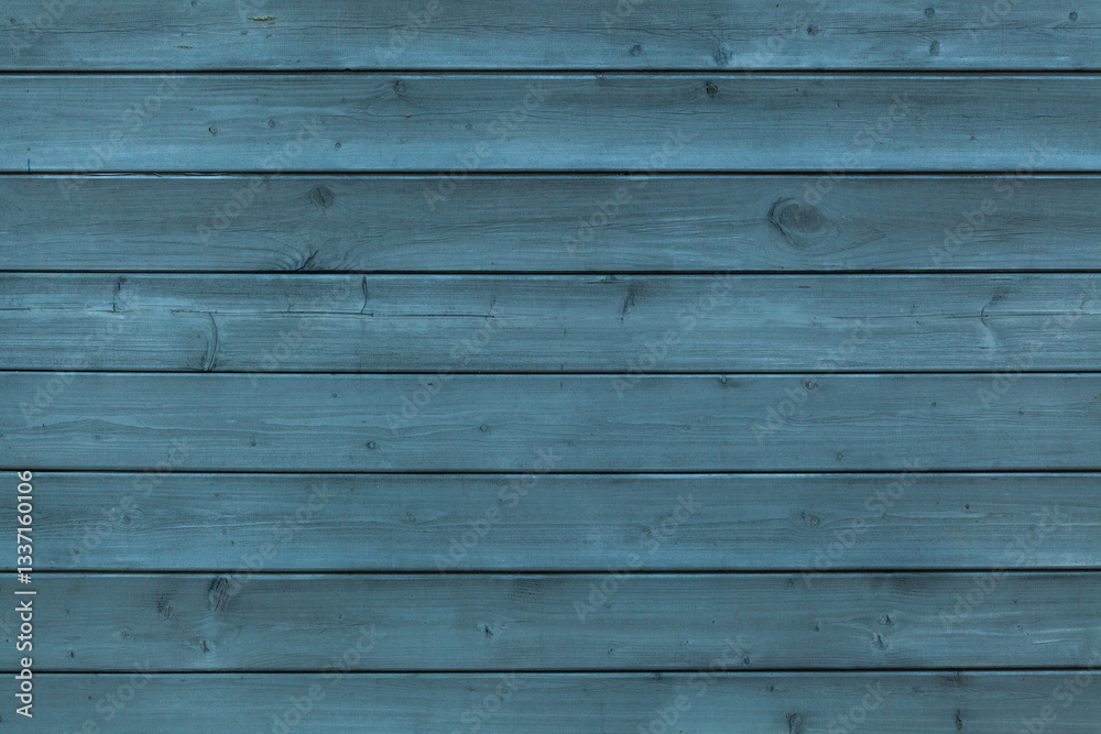 Naklejka premium texture of wooden planks painted blue color