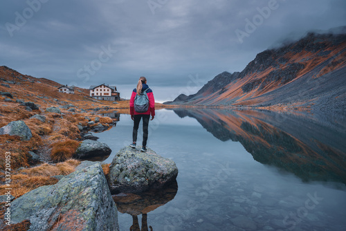 Young woman hiker with back...