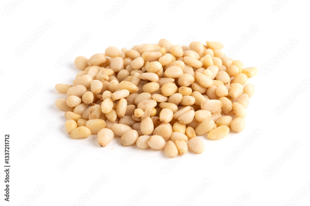Pine nuts isolated on white background. Clipping path included. Pine nuts isolated on white background. Clipping path included.