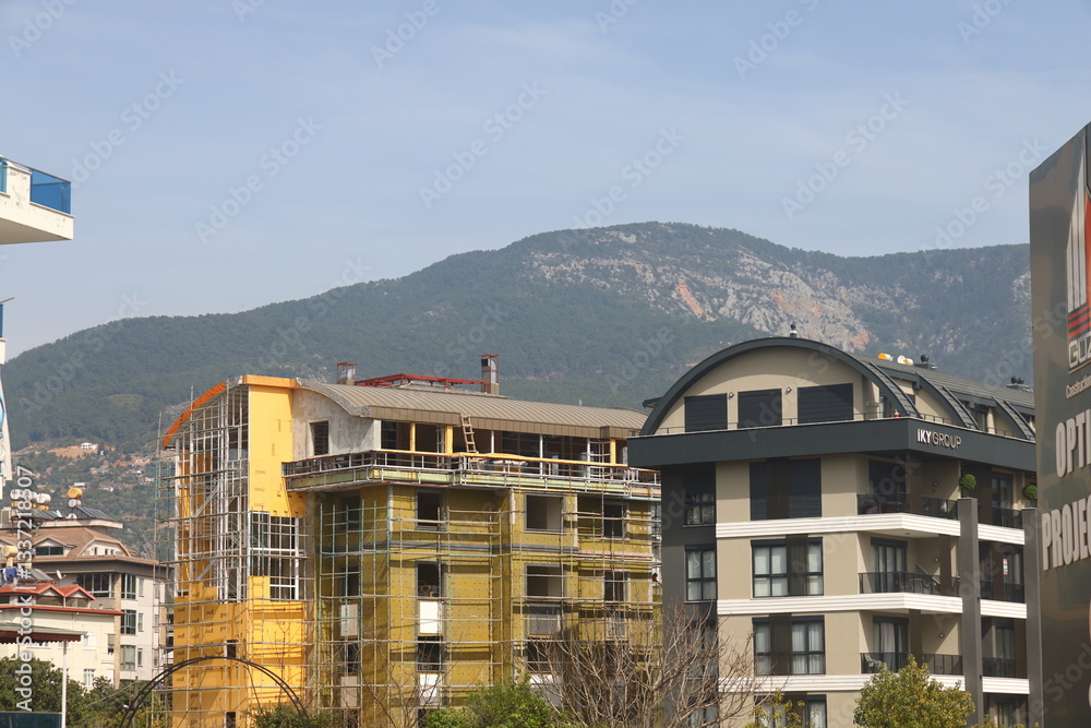 Obraz premium new buildings in Alanya against the backdrop of mountains, Alanya, Turkey, March 2025, 5