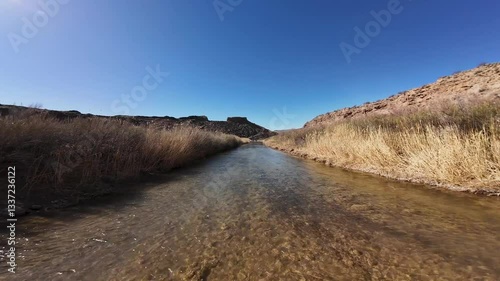 Virgin River - Hurricane, Utah, USA - February 10, 2025: Aerial-FPV-Flying fast over seasonally shallow Virgin River 