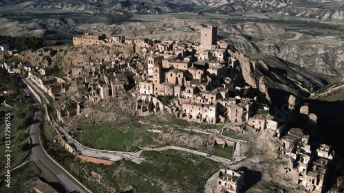 4K panoramic view of Craco, a ghost town in the Basilicata region of Italy. Stunning aerial footage capturing the historic ruins and breathtaking landscape.