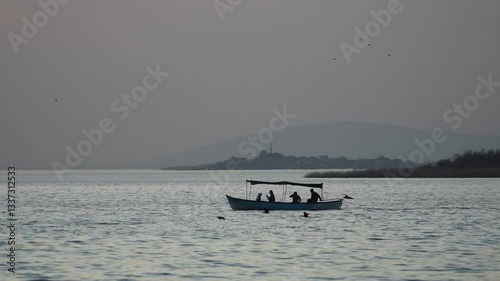 fishermen on the lake
