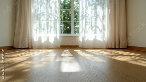 Sunbeams weave intricate patterns through sheer curtains, casting a luminous glow that bathes the polished wooden floor in serene elegance.