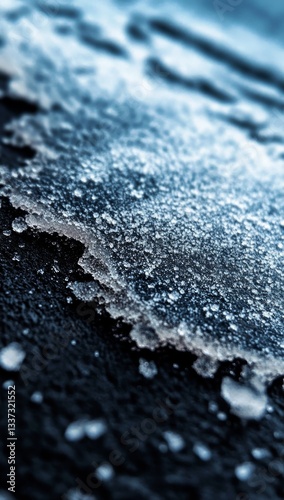 An abstract image is created using a black and white sand noise overlay, faded scanned paper, and a halftone gradient, with the overall aesthetic being reminiscent of sand