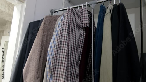 Shirt Hanging and Unfolding from Modern Clothing Rack