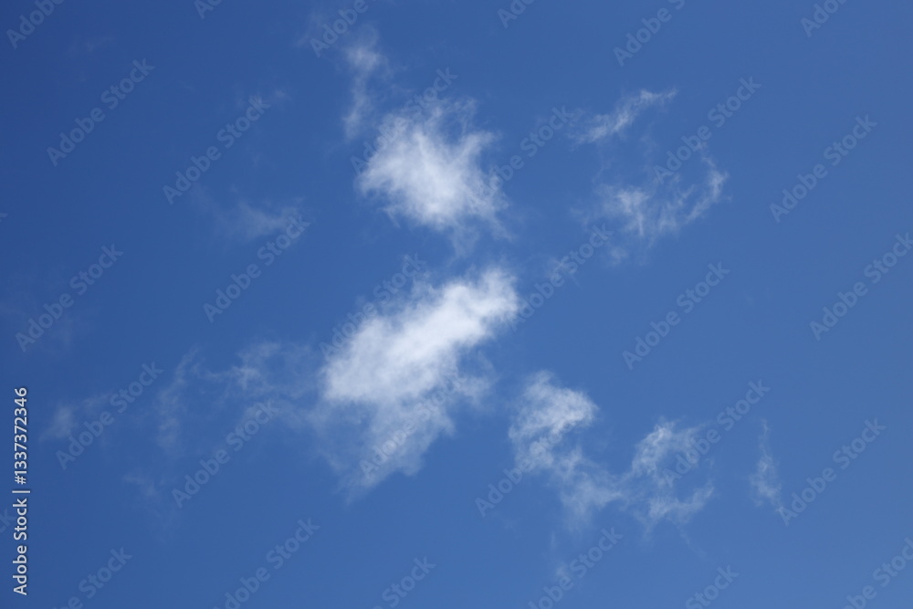 blue sky with white fluffy clouds blue sky with white fluffy clouds