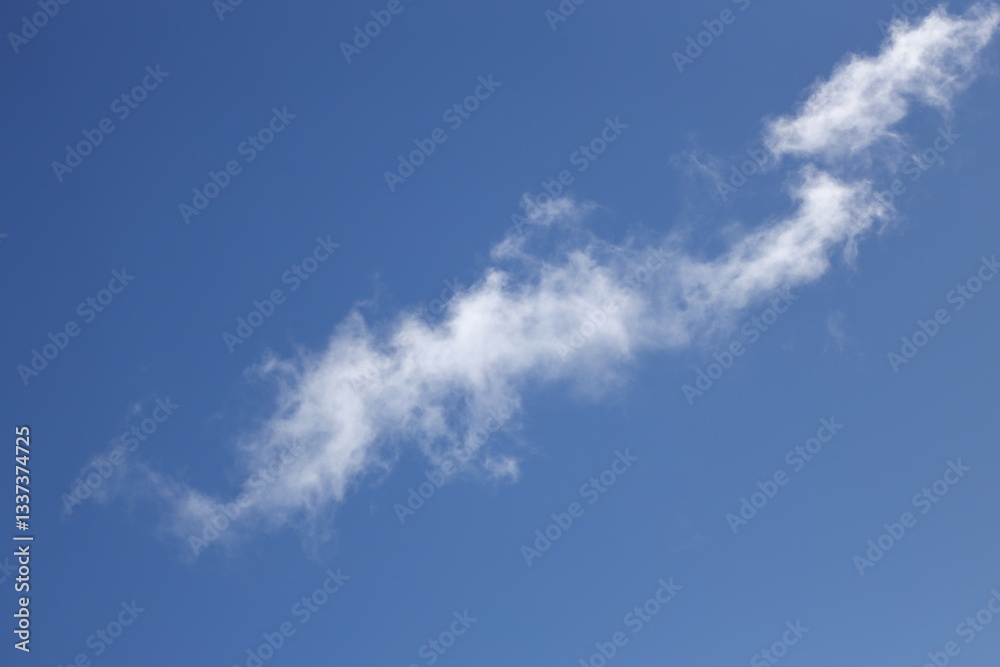 blue sky with white fluffy clouds. blue sky with white fluffy clouds.