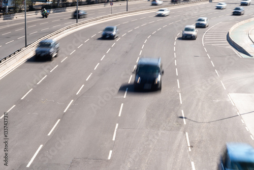 6 lane road with cars in motion. Concept of traffic and movement