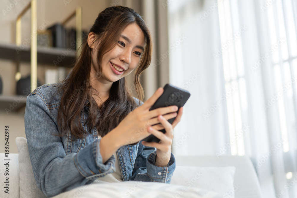 Portrait of smiling happy asian woman relax using digital smartphone.Young asian girl working or study,chatting social network and playing game online or social media,shopping online Portrait of smiling happy asian woman relax using digital smartphone.Young asian girl working or study,chatting social network and playing game online or social media,shopping online