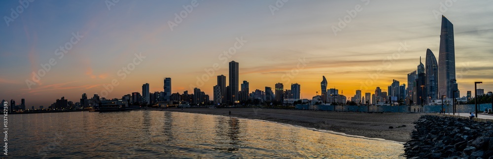 Kuwait City Skyline Panorama at Sunset with Reflections on the Arabian Gulf Kuwait City Skyline Panorama at Sunset with Reflections on the Arabian Gulf