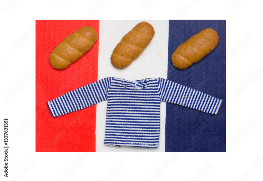 Φωτογραφία baguettes and sailor's vest on the background of the French flag