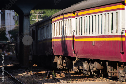 Thai railway train with locomotive runs in Bangkok