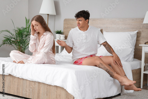 Couple in bed having relati...