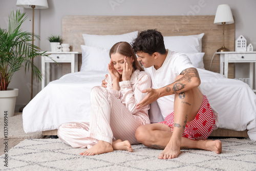 Young woman with headache a...