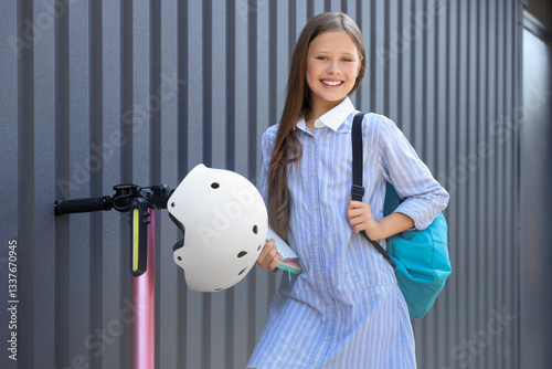 Cute schoolgirl with electr...