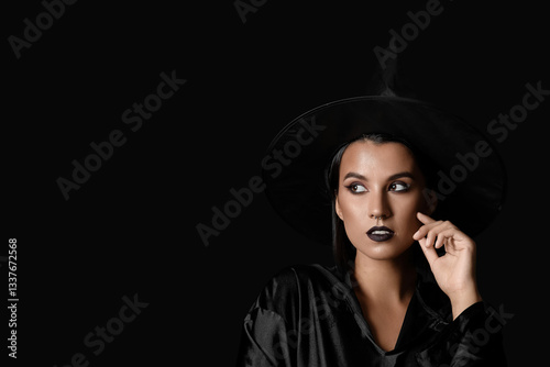 Beautiful young witch in ha...