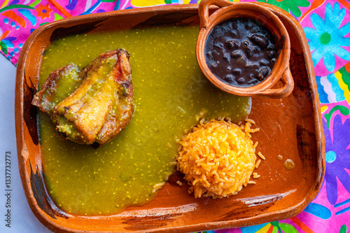 Mexican Food. Rabbit in Green Salsa with Red Rice and Black Beans