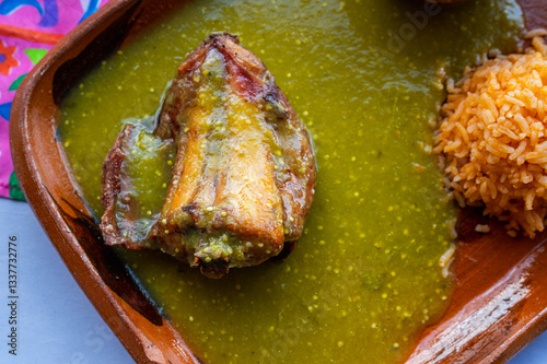 Mexican Food. Rabbit in Green Salsa with Red Rice and Black Beans