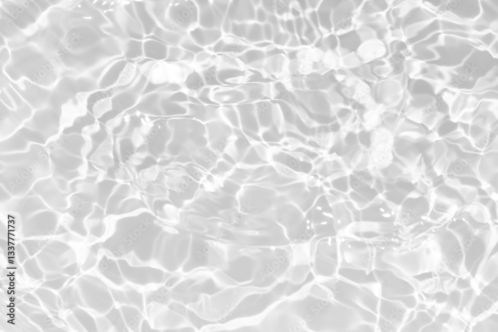 Obraz premium White water with ripples on the surface. Defocus blurred transparent white colored clear calm water surface texture with splashes and bubbles. Water waves with shining pattern texture background.