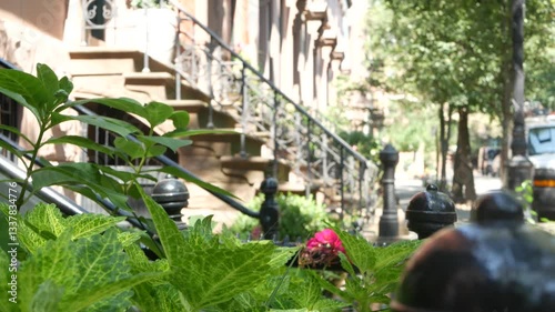 New York City townhouse building, Brooklyn Heights residential district, USA. Brownstone urban architecture, attached house. United States real estate, american property, apartments and homes in NYC.