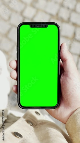 Young Man Phone Look and Busy Walking to Work Close-up. Caucasian Guy Hold in Hand Smart Phone with Screen Mock-up. Urban Life Leisure in Blank Smartphone. Use Cellphone for Footage, App, Copy Space